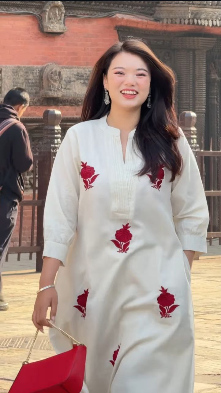 stylish white kurti with red floral work