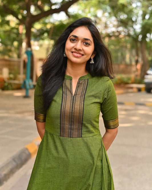 Classic Green Kurta Set – Traditional Touch with Golden Border
