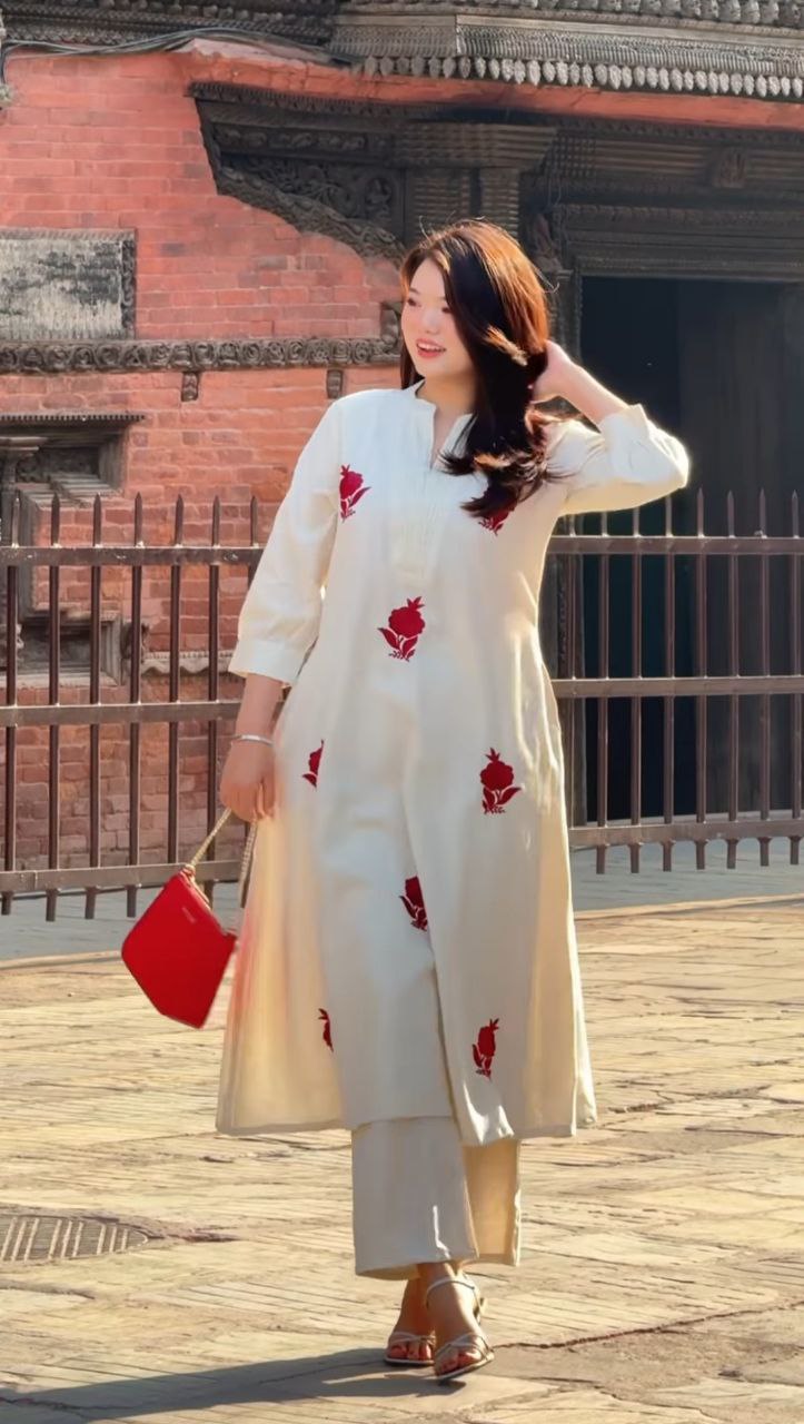 stylish white kurti with red floral work