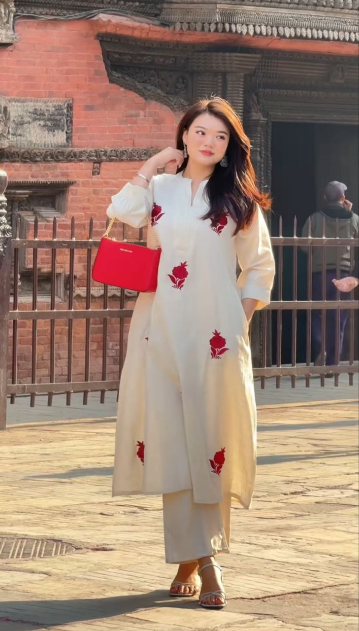 stylish white kurti with red floral work