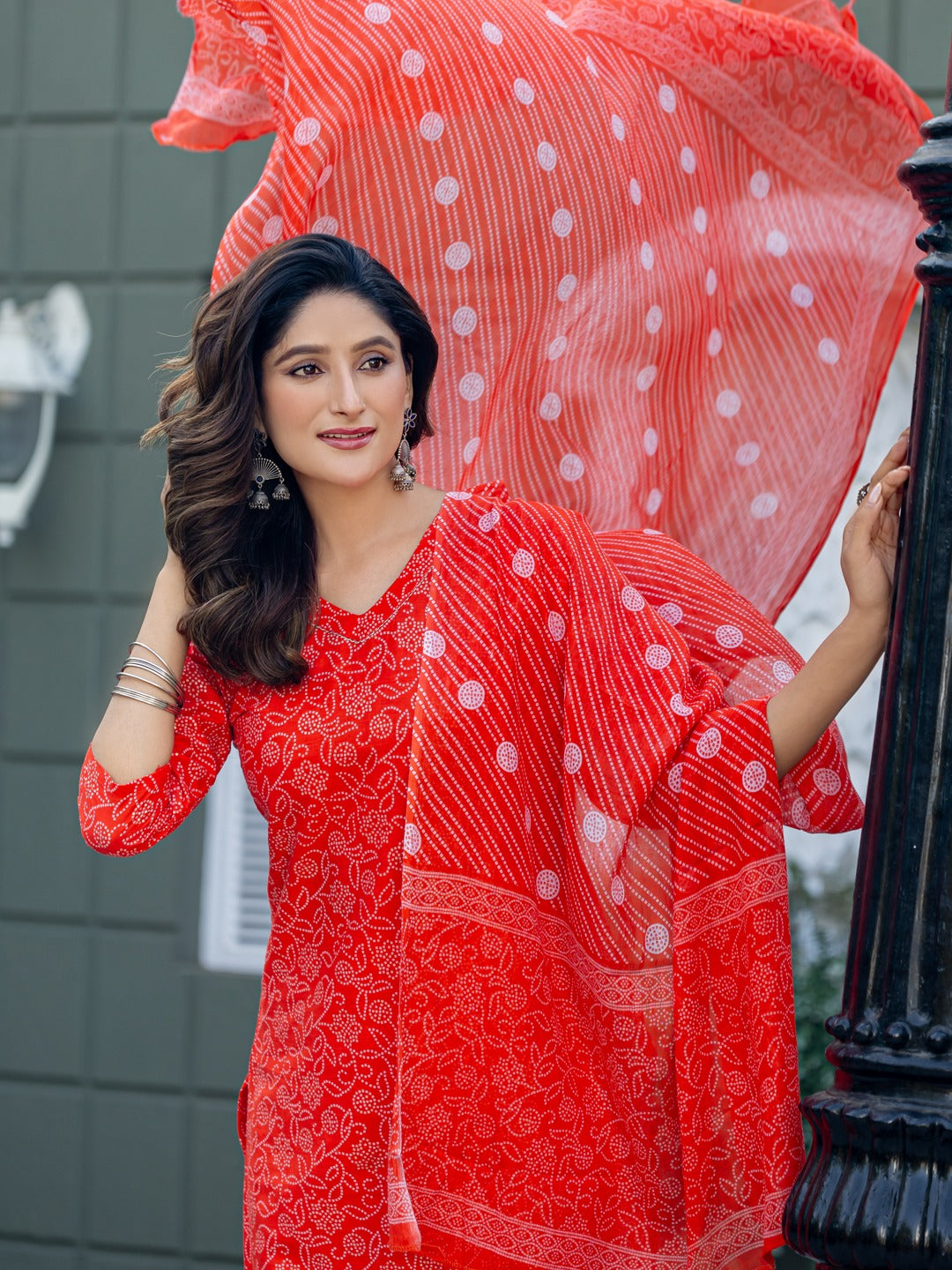 elegant orange printed kurta set with coordinated dupatta